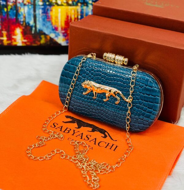 Sayasachi Clutch BLUE with a crocodile texture.
