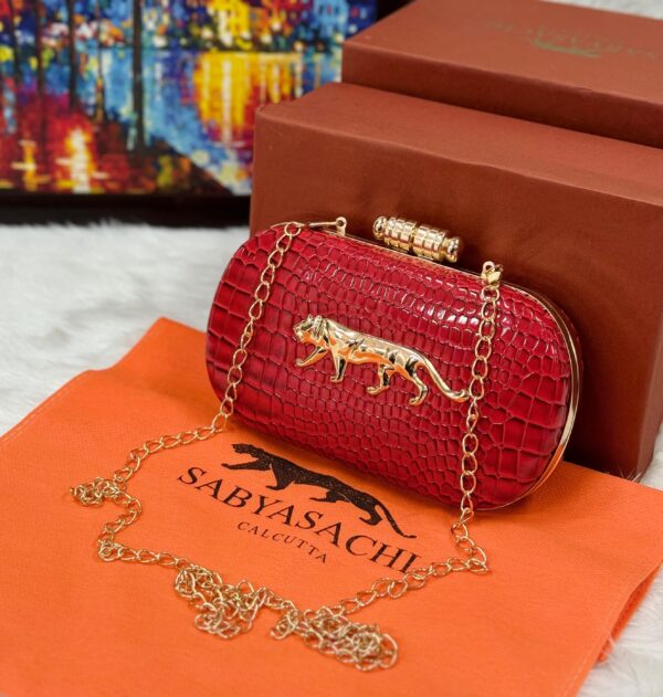 Sayasachi Clutch RED with a crocodile texture.