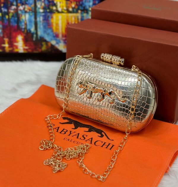 Sayasachi Clutch SILVER with a crocodile texture.